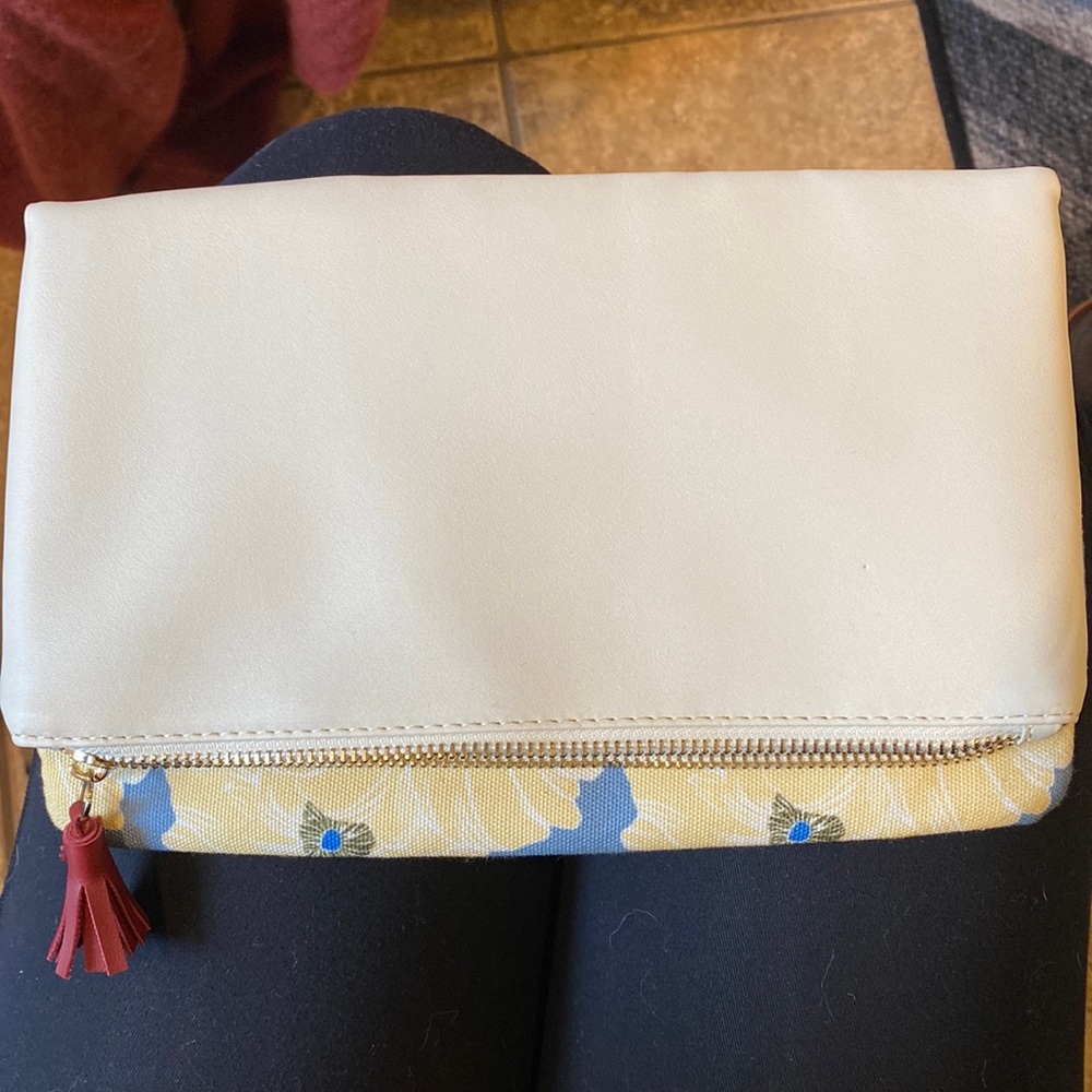 Stunning off-white limited edition reversible clutch